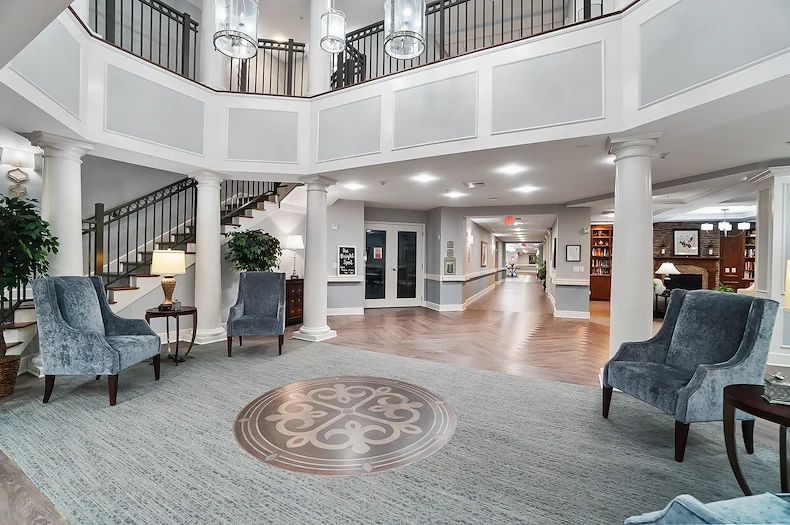 Brightmore of South Charlotte senior living community offering independent living, assisted living, and memory care in Charlotte, NC, lobby area with casual seating