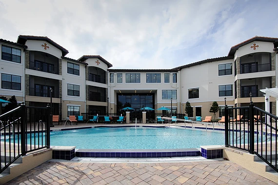 Allegro Winter Park senior living offering independent living, assisted living, memory care, and respite care in Winter Park, FL, outdoor pool with poolside seating