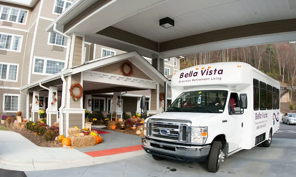 Bella Vista Gracious Retirement Living Hawthorn Senior Independent Living in Asheville, North Carolina front exterior and transportation bus