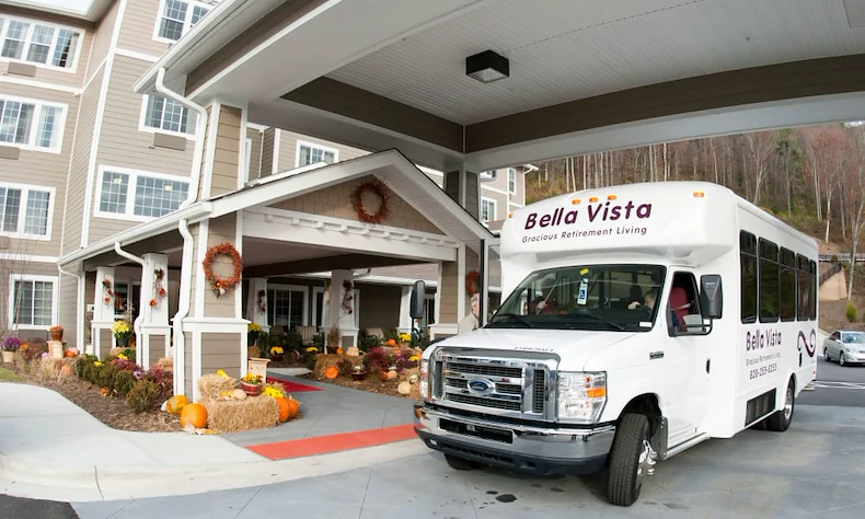 Bella Vista Gracious Retirement Living Hawthorn Senior Independent Living in Asheville, North Carolina front exterior and transportation bus