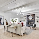 Legato Living Residential Memory Care at Indian Hills senior living community offering assisted living and memory care in Omaha, NE, community living room with a large black fireplace