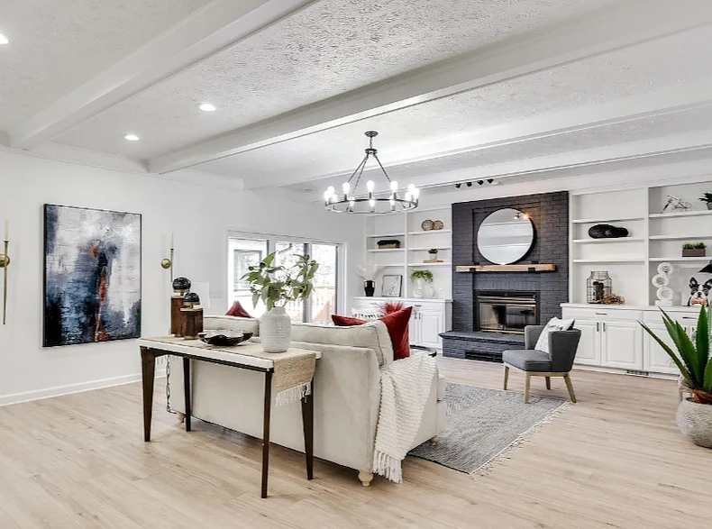 Legato Living Residential Memory Care at Indian Hills senior living community offering assisted living and memory care in Omaha, NE, community living room with a large black fireplace