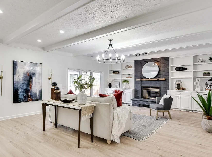 Legato Living Residential Memory Care at Indian Hills senior living community offering assisted living and memory care in Omaha, NE, community living room with a large black fireplace