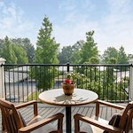 Wenatchee Senior Living by Cogir senior living community offering independent living, assisted living, and respite care in Wenatchee, WA, outdoor balcony with seating and a view