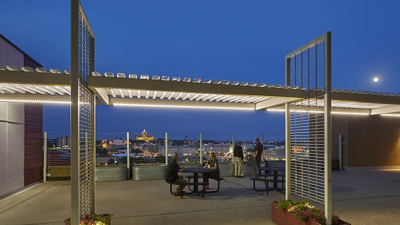 Ligutti Tower independent senior living outdoor patio with skyline view