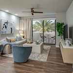 Allegro Fort Lauderdale, senior living community in Fort Lauderdale, FL, offering independent living, assisted living, memory care, and respite care, apartment living room with a walk out balcony