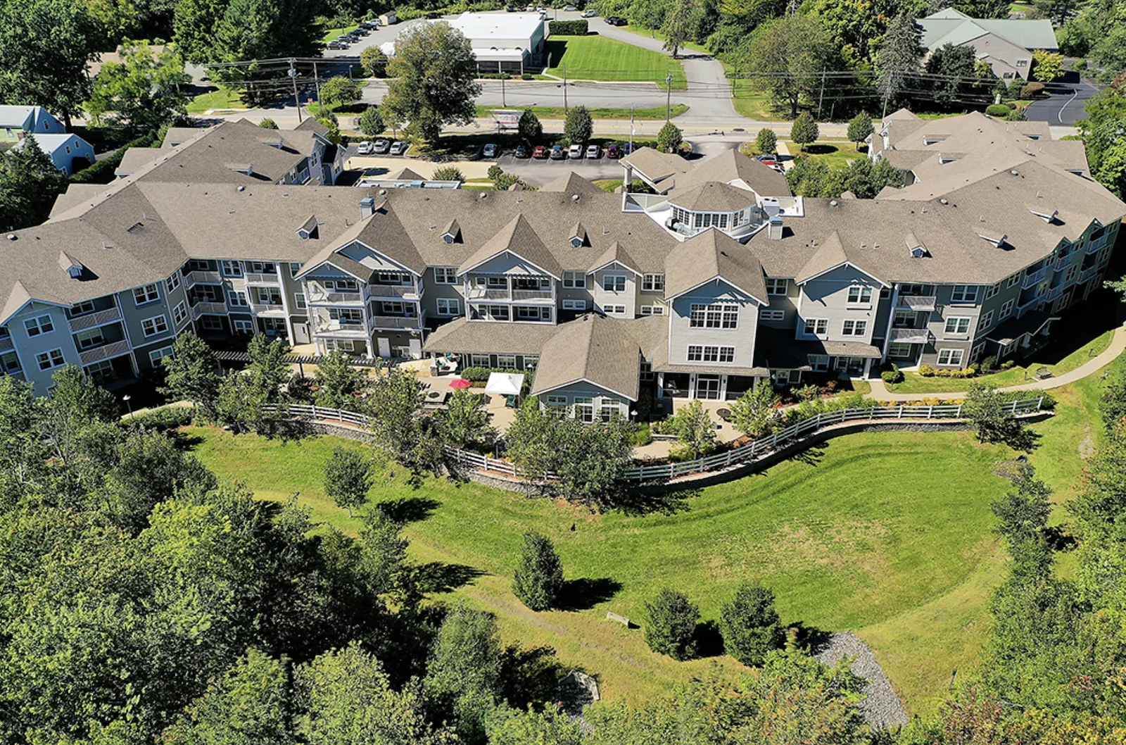 The Highlands Gracious Retirement Living Hawthorn Senior Independent Living in Westborough, Massachusetts rear exterior drone view