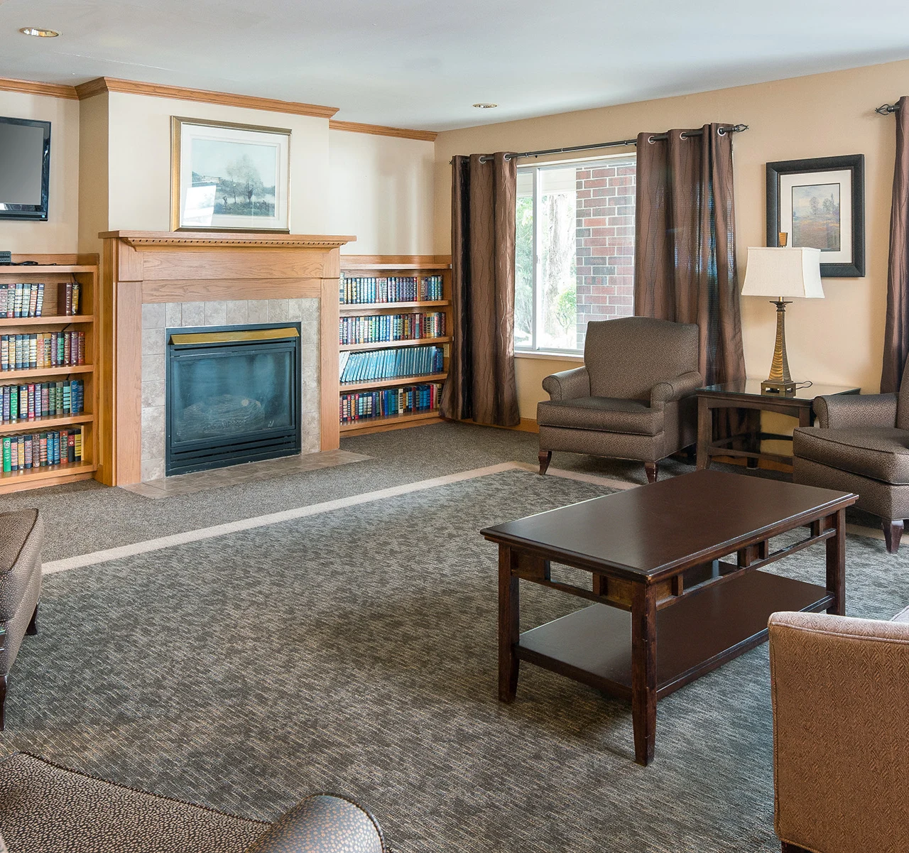 Park Vista Retirement Living North Hill East Moline, IL, living room with fireplace