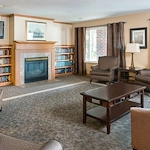 Park Vista Retirement Living North Hill East Moline, IL, living room with fireplace