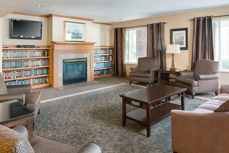 Park Vista Retirement Living North Hill East Moline, IL, living room with fireplace