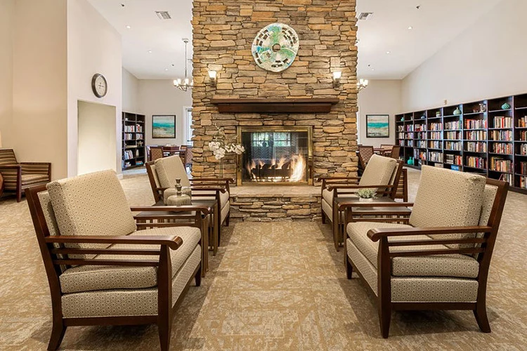 Woodbridge Terrace of Irvine, independent living, assisted living, and memory care in Irvine, CA, sitting area by fireplace