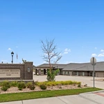 Assisted living and memory care at Belleview Heights Senior Living in Aurora, CO, exterior and community sign