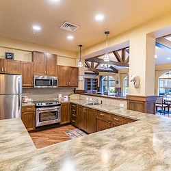 Aspens at Fort Collins Senior Living, senior living community offering assisted living, memory care, and respite care in Fort Collins, CO, community kitchen with modern appliances
