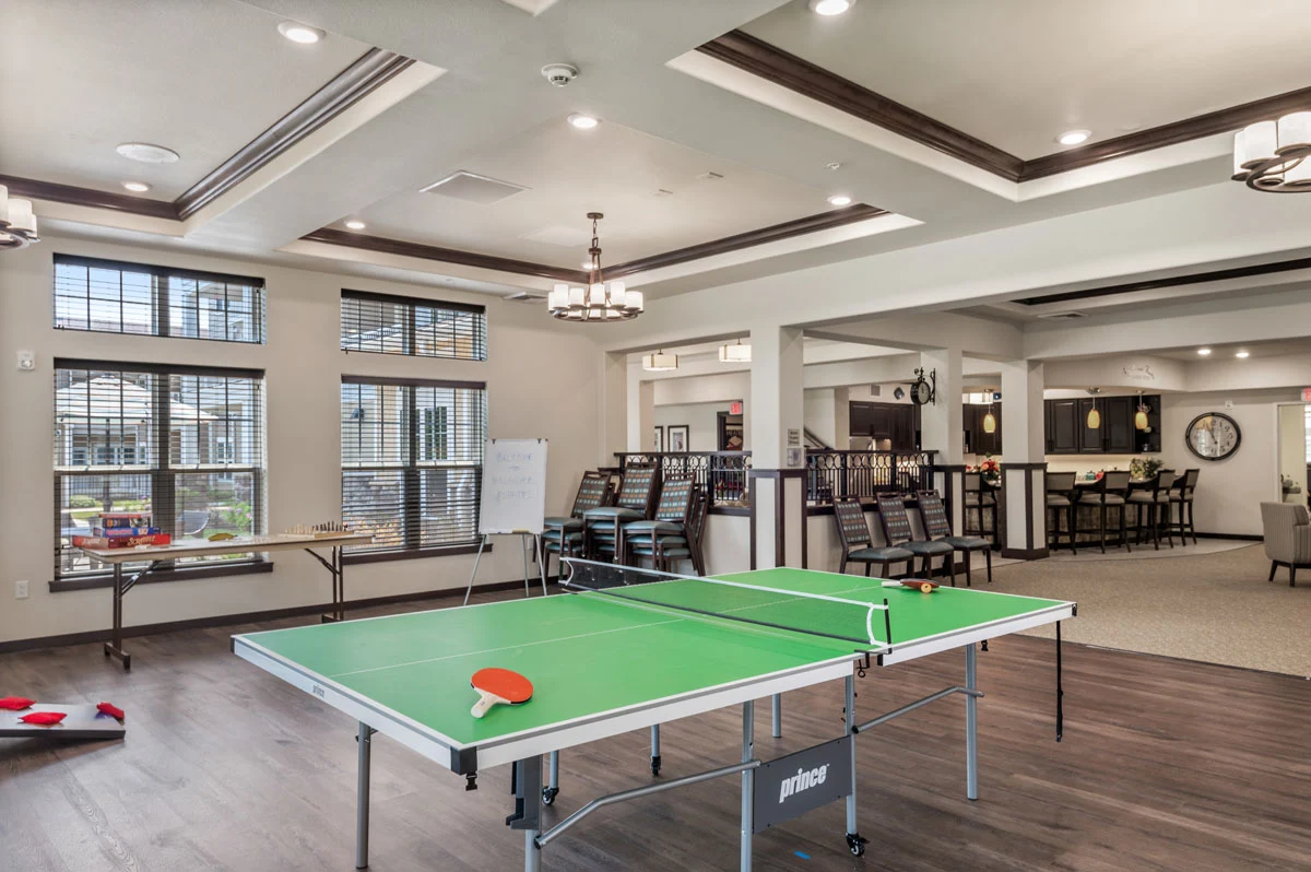 Wilshire Estates Gracious Retirement Living, independent living in Silver Spring, MD, activities room with ping pong table
