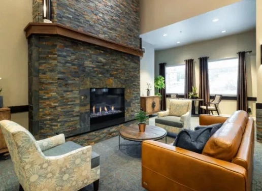 Fieldstone on Clear Creek Independent and Assisted Living sitting area by fireplace