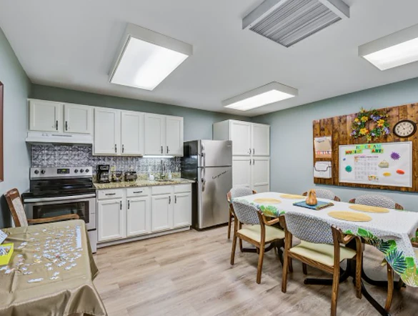 Bennett Place in New Albany, IN, kitchen with dining table