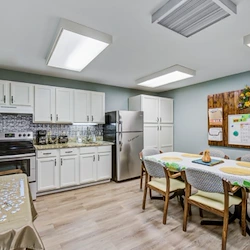 Bennett Place in New Albany, IN, kitchen with dining table