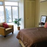 Plymouth Place independent living apartment bedroom