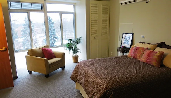 Plymouth Place independent living apartment bedroom