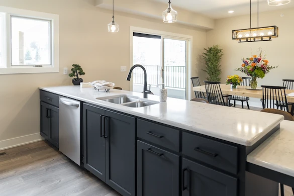 Legato Living Residential Memory Care at Five Fountains senior living community offering assisted living, memory care, adult day services, and respite care in Elkhorn, NE, kitchen island and view into the dining area