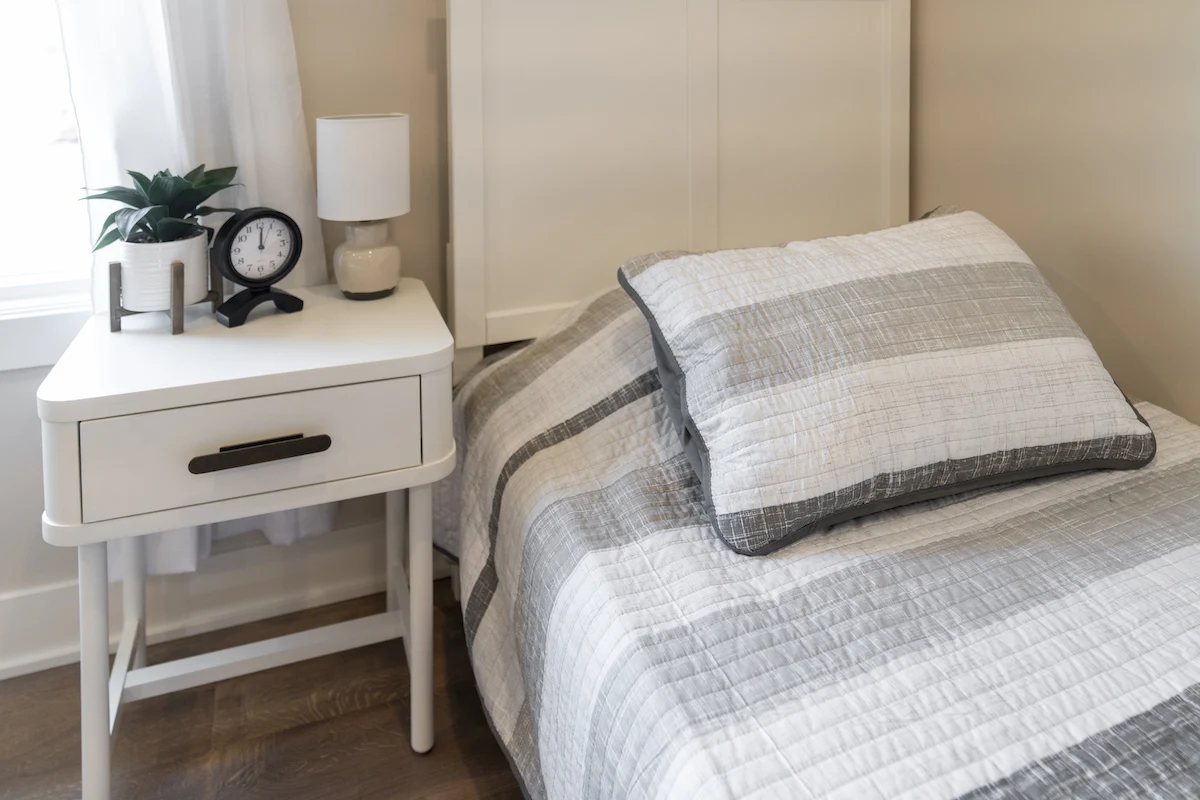 Legato Living Residential Memory Care at Five Fountains senior living community offering assisted living, memory care, adult day services, and respite care in Elkhorn, NE, bed and nightstand