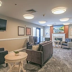 Charter Senior Living of Annapolis sitting area with fire place
