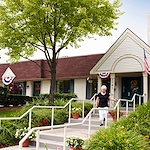 American House Stone senior living community offering independent living and respite care in Rochester Hills, MI, front exterior