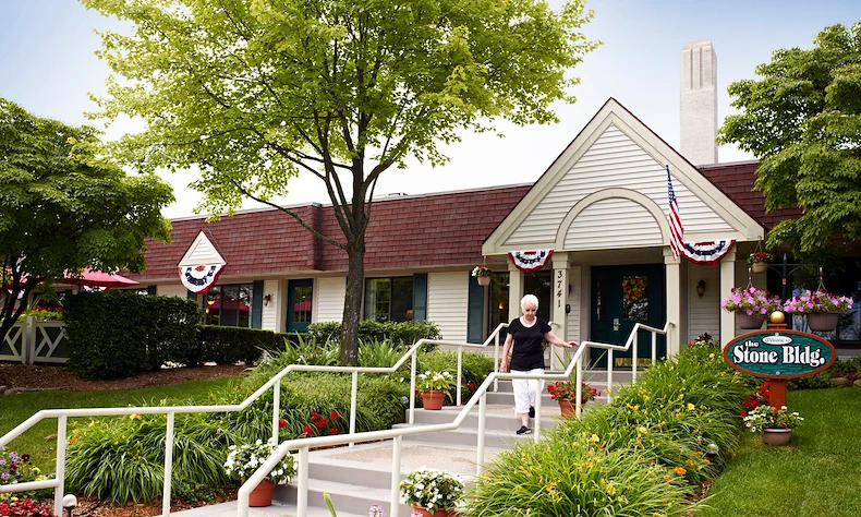 American House Stone senior living community offering independent living and respite care in Rochester Hills, MI, front exterior