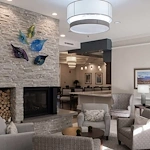 Bartlett Reserve independent living in Durham, NC, sitting area by fireplace