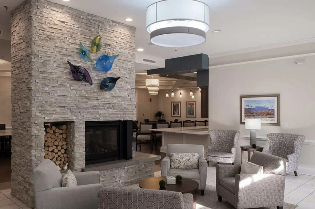 Bartlett Reserve independent living in Durham, NC, sitting area by fireplace