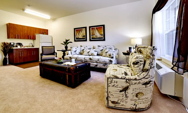 Linwood Estates Gracious Retirement Living Hawthorn Senior Independent Living in Lawrenceville, Georgia apartment living room and kitchenette