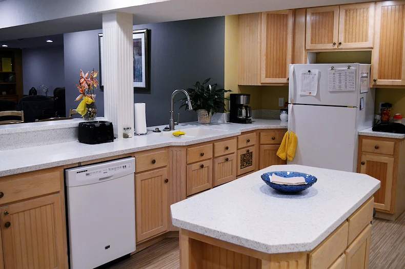 Legato Living Residential Memory Care at Legacy senior living community offering assisted living, memory care, adult day services, and respite care in Omaha, NE, community kichen with a view in the living room