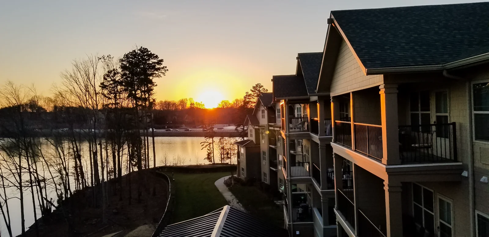 Williams Place Gracious Retirement Living Hawthorn Senior Independent Living in Davidson, North Carolina rear exterior sunset