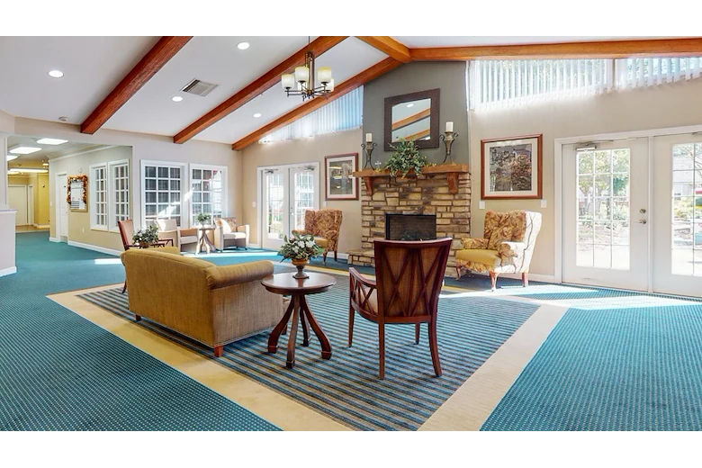 Indoor lounge area and fireplace at Gaines Park