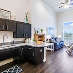 Kitchen and living area of a Vincent Senior Living Community apartment