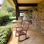 Active adult living and independent living at Watercrest at Mansfield in Mansfield, TX, outdoor covered sitting area