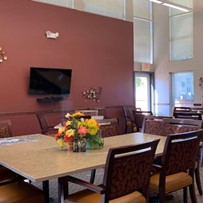 Suncrest Village independent senior living apartments in Newton, Iowa community media dining room