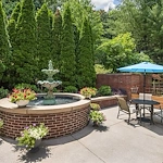 Brookdale Green Hills Cumberland senior living community offering assisted living, memory care, and respite care in Nashville, TN, outdoor space with seating and a water feature