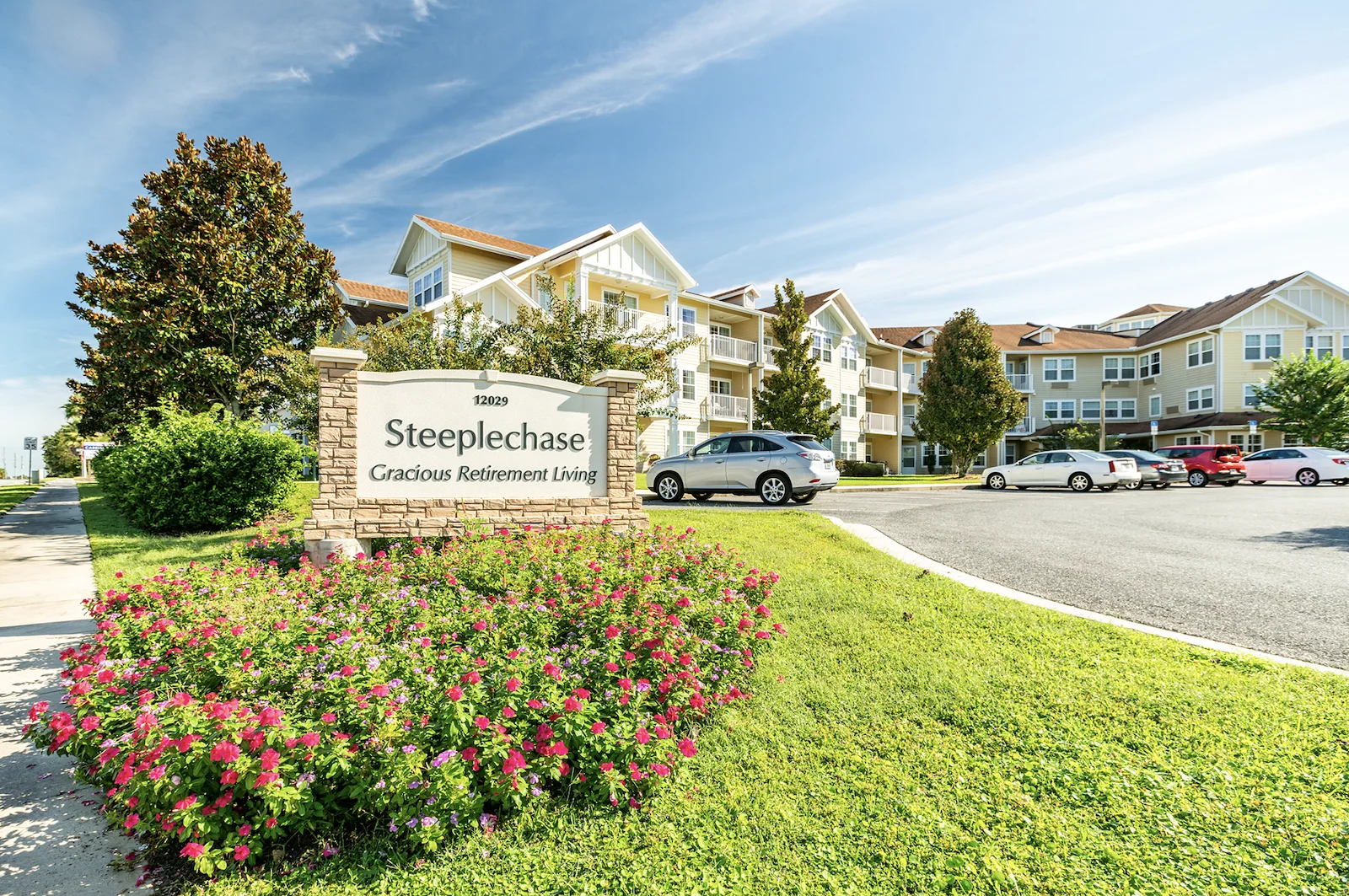 Steeplechase Gracious Retirement Living Hawthorn Senior Independent Living in Oxford, Florida front exterior welcome sign
