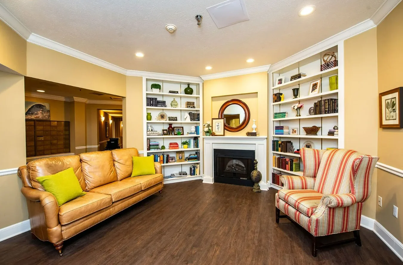 Westlake Woods by New Perspective senior living community offering assisted living in Erie, PA, lounge area by fireplace