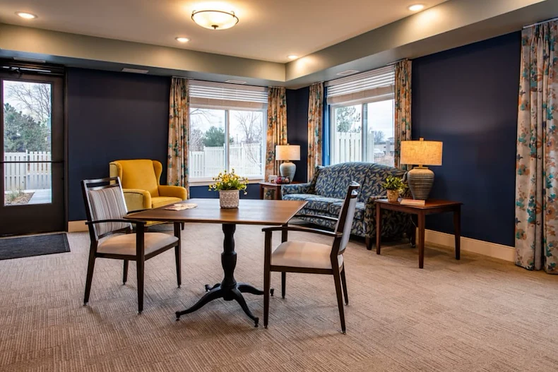 Independent living, assisted living, memory care, and respite care at Broadwell Senior Living – Plymouth in Plymouth, MN, community room with a lounging area and tables for games