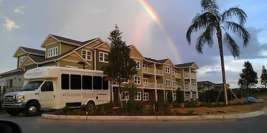 Orchard Heights Gracious Retirement Living Hawthorn Senior Independent Living in Clermont, Florida front exterior transportation bus