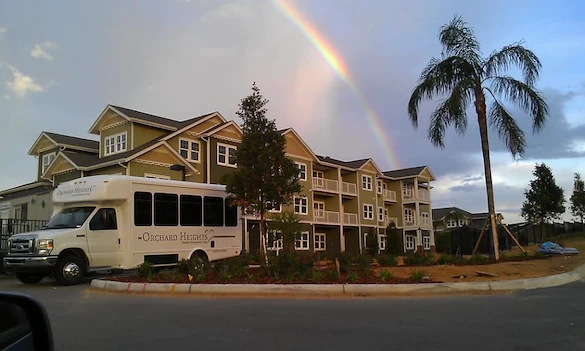 Orchard Heights Gracious Retirement Living Hawthorn Senior Independent Living in Clermont, Florida front exterior transportation bus