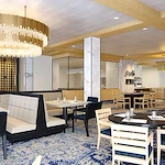 Wellington Bay with Lisbet Health Center senior living community offering independent living, assisted living, and memory care in Wellington, FL, dining room with a variety of seating options