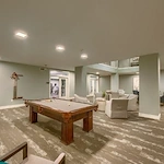 Pool table and game room at Verena at Leander Senior Living