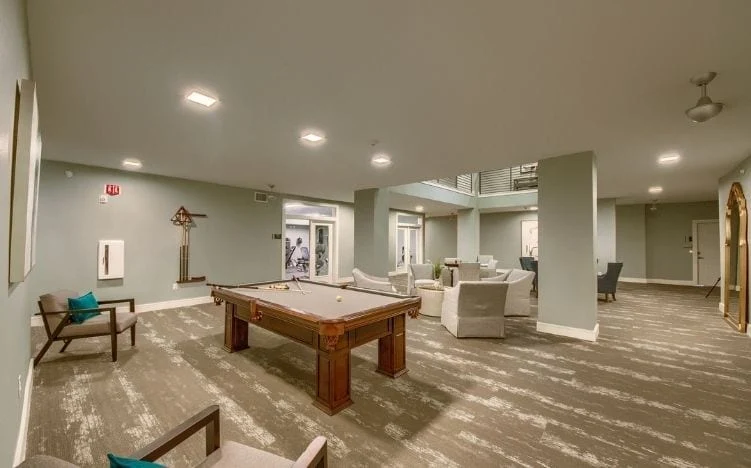 Pool table and game room at Verena at Leander Senior Living