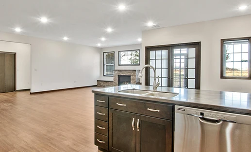 Kidron Bethel Village senior living community and continuing care retirement community (CCRC) offering independent living, assisted living, and respite care in North Newton, KS, home kitchen and living room