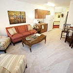 Desert Springs Gracious Retirement Living Hawthorn Senior Independent Living in Oro Valley, Arizona apartment living room and kitchenette