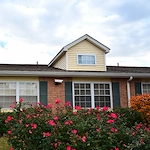 Rosewalk at Lutherwoods Assisted Senior Living in Indianapolis, IN front exterior with flower landscaping