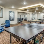Watermere at Woodland Lakes senior living community offering active adult living and independent living in Conroe, TX, activities room with table tennis and a pool table